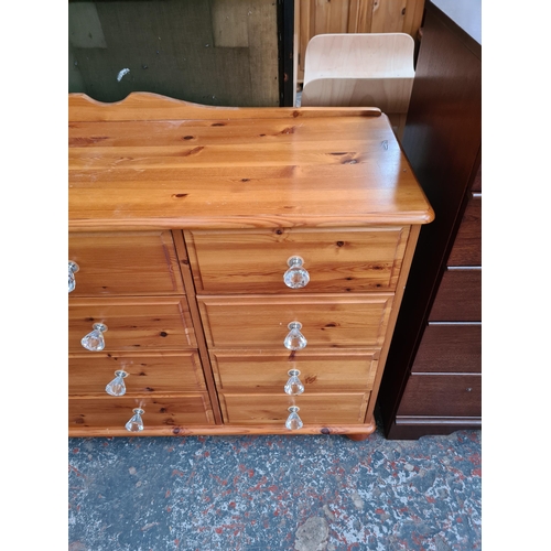 1090 - A modern pine chest of six short and three long drawers - approx. 75cm high x 120cm wide x 40cm deep