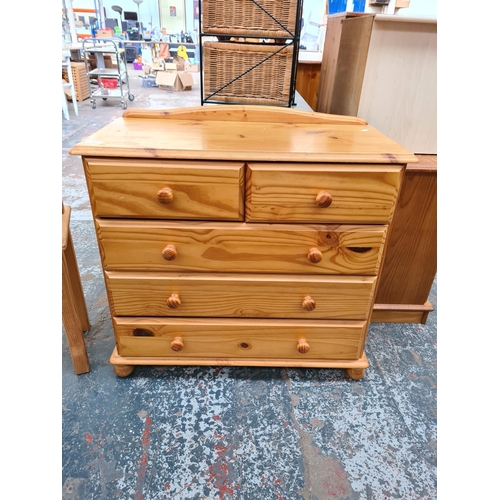 1097 - Three pieces of modern pine furniture, chest of two short over three long drawers - approx. 83cm hig... 