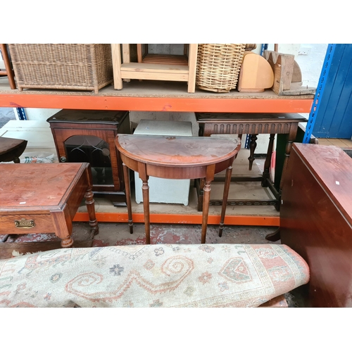 1101 - A large quantity of assorted house clearance furniture to include mahogany half moon console table, ... 