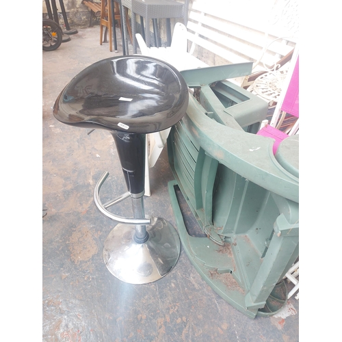 1228 - Nine items to include vintage folding wooden chairs, chrome gas lift bar stool with black seat, gree... 