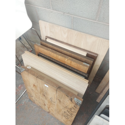 1235 - A large quantity of assorted table tops to include pine, oak, laminate etc.