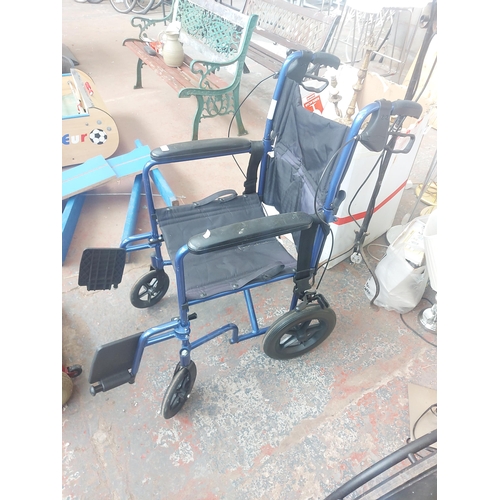 1247 - Two items, one Drive black self-propelled folding wheel chair and one blue Drive folding wheelchair ... 