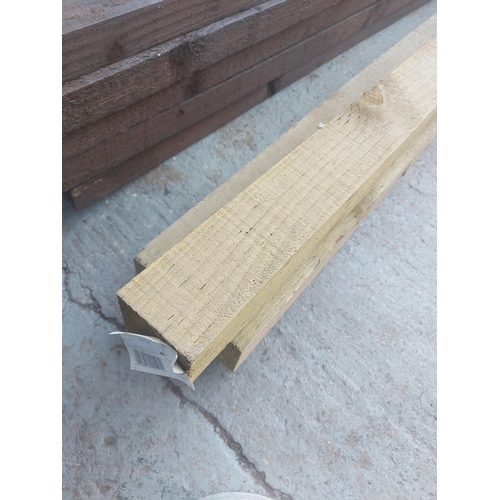 1257 - Three lengths of tanalised timber - approx. 8' long x 3