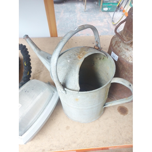 1263 - Four items, one vintage galvanized watering can, one cast aluminium outdoor light, one heavy duty ro... 