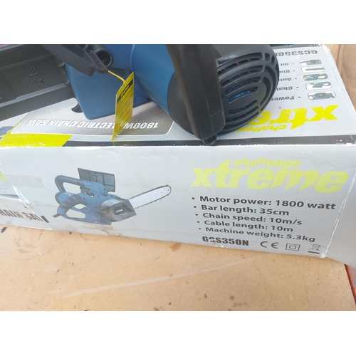 1266 - A boxed black and blue Challenge Xtreme electric chainsaw with 14