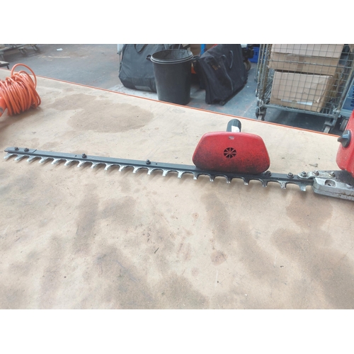 1271 - A red Shindaiwa HY230 petrol hedge trimmer with 29