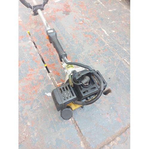 1276 - A black and grey Stihl FS66 petrol strimmer