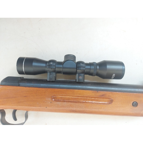 1281 - An unbranded model 162 break barrel air rifle with telescopic sight