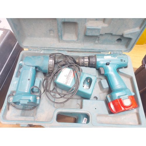 1288 - Two cased Makita power tools, one 14.4v cordless drill with battery and one 6227D 12v cordless drill... 