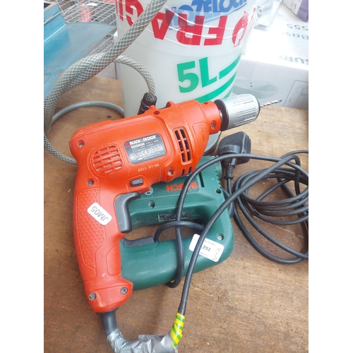 1292 - Three items, one green Bosch PST53A electric jig saw, one orange Black & Decker KR504CRES electric d... 