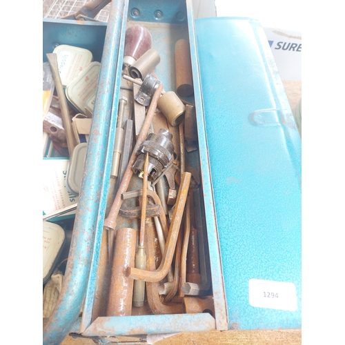 1294 - A blue metal cantilever tool box containing allen keys, bicycle spanners, drill chuck, spark plug sp... 