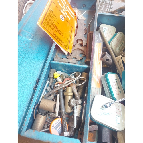 1294 - A blue metal cantilever tool box containing allen keys, bicycle spanners, drill chuck, spark plug sp... 