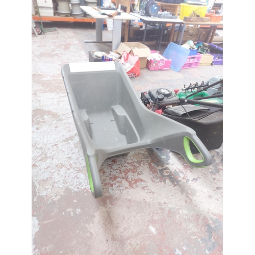 1340 - A Keter plastic two wheel gardener's wheelbarrow