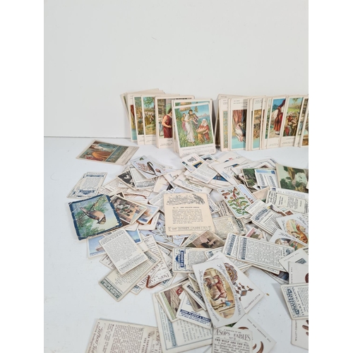 336 - A large collection of vintage cigarette cards to include two Senior Service card albums, Wills, John... 