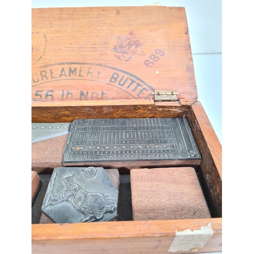 364 - A vintage wooden box containing various items to include metal & wooden printing blocks, W. Marples ... 