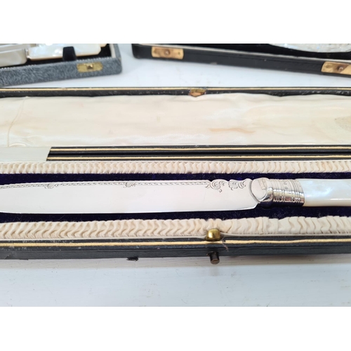 288 - Three vintage cased items, George V EPNS cake knife with hallmarked Sheffield collar, dated 1912 and... 