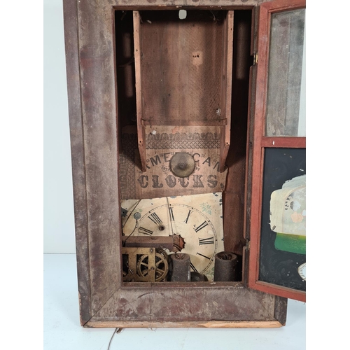 292 - A late 19th century American Jerome & Co mahogany wall clock with white enamel face, key and weights... 