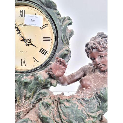 294 - A Juliana bronzed resin figural quartz mantel clock - approx. 35cm high x 43cm wide x 16cm deep