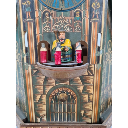 300 - A vintage E. Schmeckenbecher hand painted wooden cuckoo clock - approx. 39cm high x 28cm wide x 15 d... 