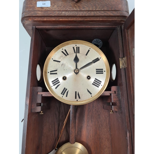 301 - A vintage oak cased chiming wall clock with pendulum and key - approx. 80cm high x 33cm wide x 17.5c... 