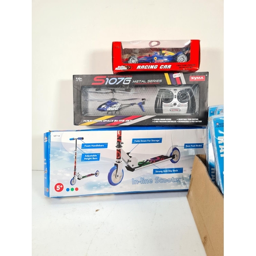 303 - A collection of assorted boxed toys, Racing Machines Friction Power Racing Car, Syma S107G Metal Ser... 