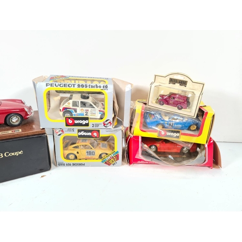 304 - Six various diecast model vehicles, Bburago Ferrari 308 GTB, Bburago Porsche 959 Raid, Lledo Days Go... 