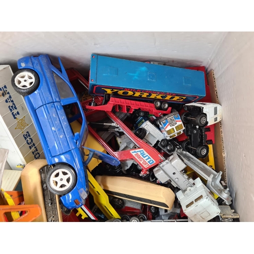 309A - A large collection of assorted diecast model vehicles to include Bburago ford Escort RS Cosworth, Co... 