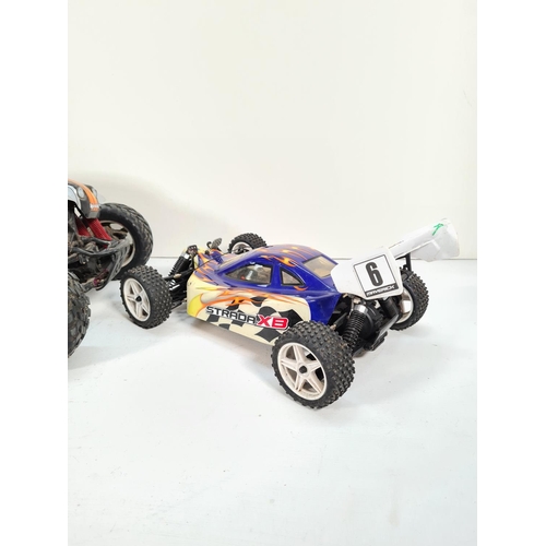 310 - Two battery operated remote control cars, one HPI Racing E Savage and one Maverick Strada XB with Ni... 