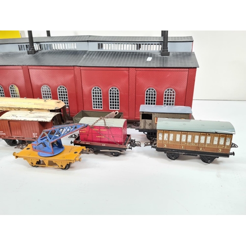 315 - A collection of mid 20th century Hornby tinplate O gauge railway models and accessories to include B... 