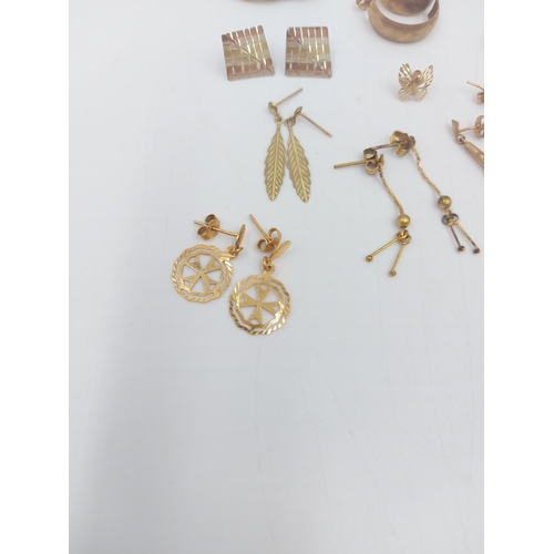 55 - A collection of assorted yellow metal jewellery to include a pair of 9ct gold Maltese cross earrings... 