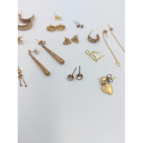 55 - A collection of assorted yellow metal jewellery to include a pair of 9ct gold Maltese cross earrings... 