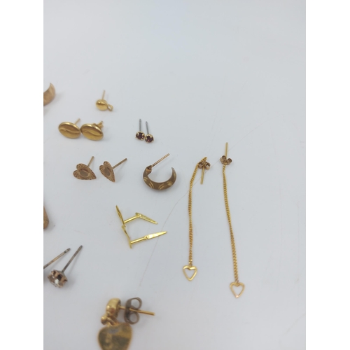 55 - A collection of assorted yellow metal jewellery to include a pair of 9ct gold Maltese cross earrings... 