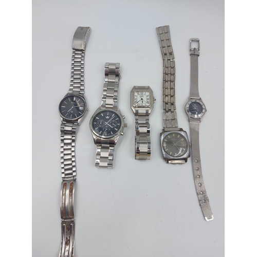 90 - A large collection of wristwatches to include Casio, Sekonda, Seiko, Citizen, Lucerne, Adrem etc.