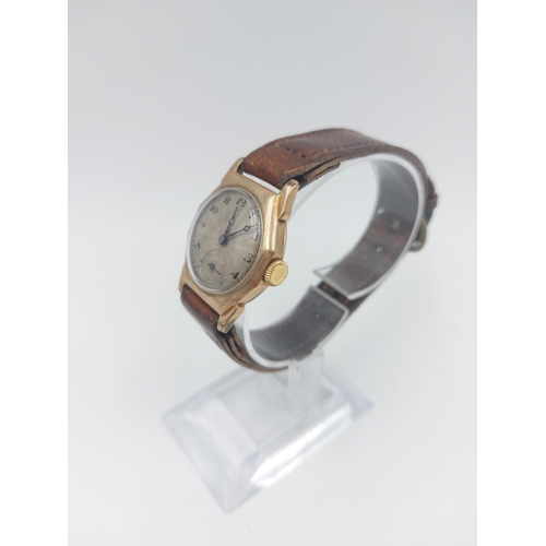 95 - An Art Deco men's hallmarked 9ct gold cased wristwatch with silvered face, sub second dial at six an... 