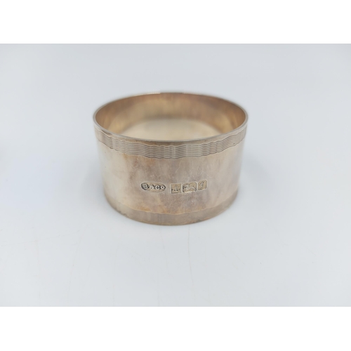 157 - A pair of hallmarked Birmingham silver napkin rings, dated 1981 - approx. gross weight 58 grams