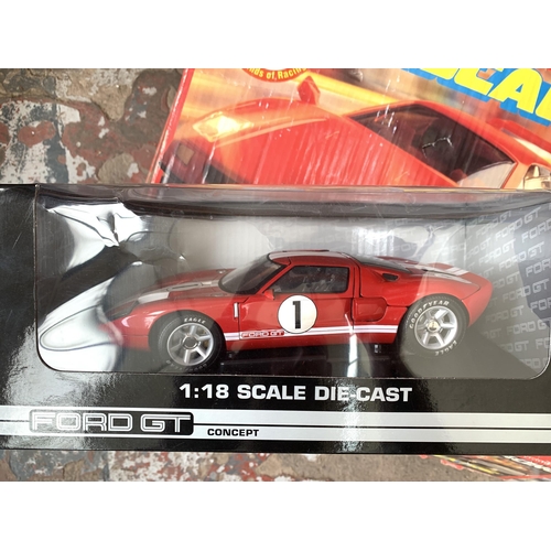 1427 - Three items, one boxed 1/18 scale Ford GT die-cast model car, classic Scalextric track with transfor... 