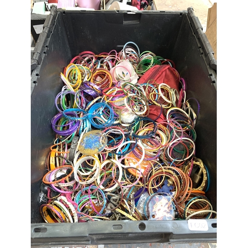 1433 - Two boxes containing a large quantity of various colour bangles