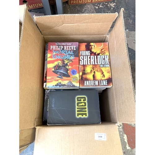 1438 - Two boxes and one bag containing black & red UK size 3 Razor rugby boots, Goosebumps books, metal co... 