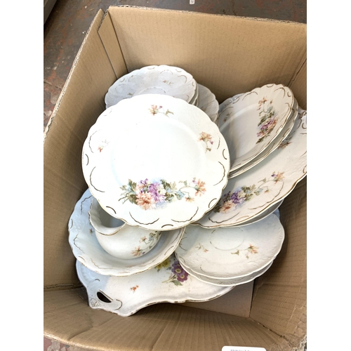 1452 - A box containing china plates, jug, bowl etc.