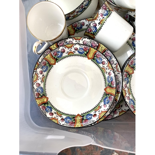 1458 - A box containing Sutherland & Delphine china to include cups, saucers, plates etc.