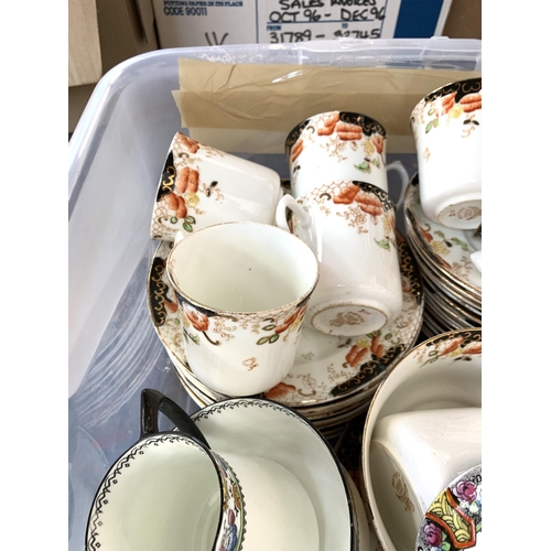 1458 - A box containing Sutherland & Delphine china to include cups, saucers, plates etc.