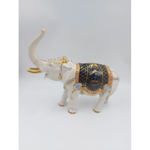 241 - A vintage German porcelain elephant figurine with 'S' makers mark to base - approx. 24cm high x 26cm... 