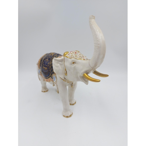 241 - A vintage German porcelain elephant figurine with 'S' makers mark to base - approx. 24cm high x 26cm... 