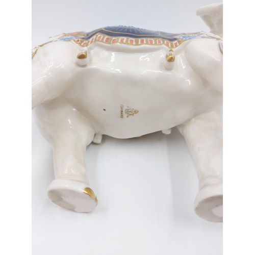 241 - A vintage German porcelain elephant figurine with 'S' makers mark to base - approx. 24cm high x 26cm... 