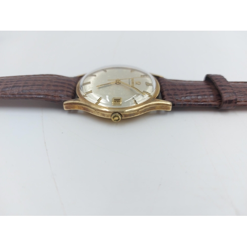 90A - A late 1960s/early 70s Omega 9ct gold automatic wristwatch with brown leather strap - approx. gross ... 