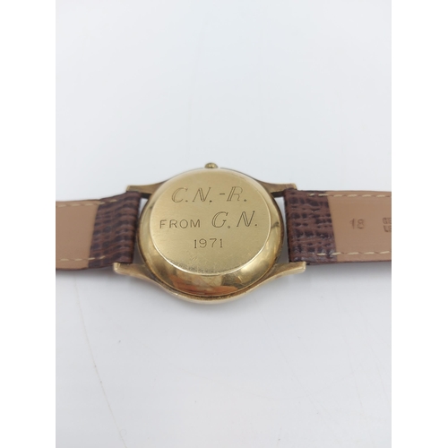 90A - A late 1960s/early 70s Omega 9ct gold automatic wristwatch with brown leather strap - approx. gross ... 