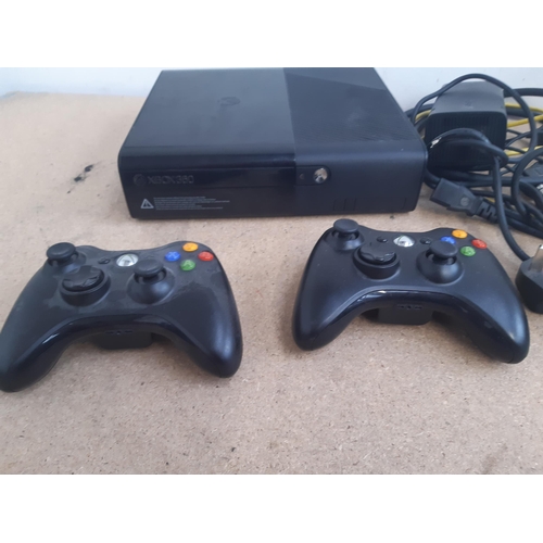 1150 - A collection of Xbox 360 items to include model 1538 360E console, two wireless controllers, power a... 