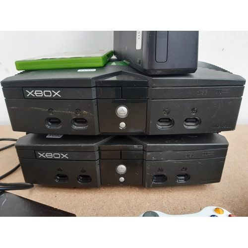 1158 - A collection of Xbox items to include model 1439 Xbox 360S console, two Xbox consoles, wireless cont... 