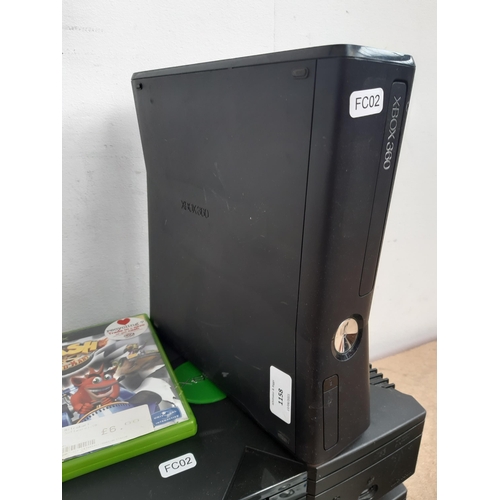 1158 - A collection of Xbox items to include model 1439 Xbox 360S console, two Xbox consoles, wireless cont... 