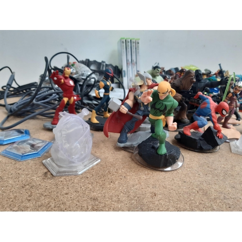 1161 - A collection of console gaming accessories and figures to include Skylanders, Star Wars and Marvel f... 